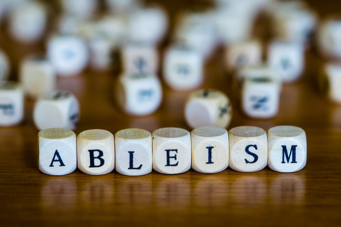 Ableism written with wooden cubes